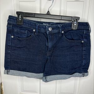 Mid-rise, stretchy, blue jean cuffed shorts Size: 10/30